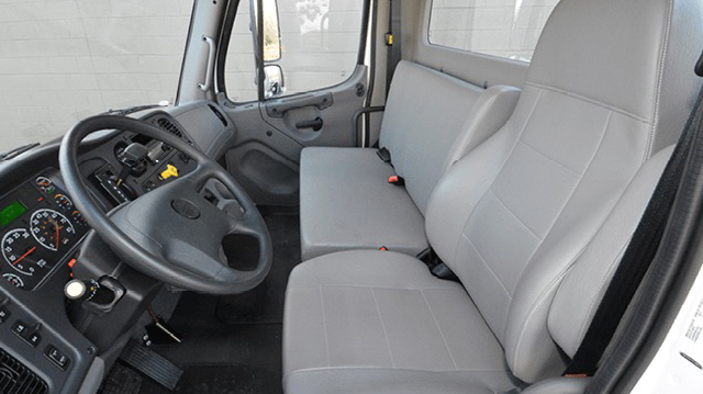 Photo of the Inside of a Freightliner M2 106 Truck