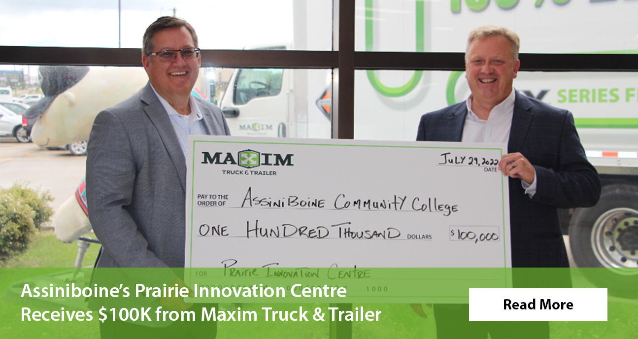 photo of maxim's president handing a cheque to someone